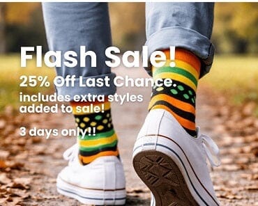 Person wearing colorful socks with a flash sale text overlay on a blurred outdoor background